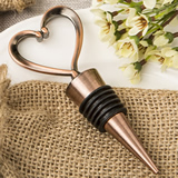 Vintage heart shaped all metal bottle stopper in an antique copper plated finish
