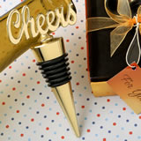 Cheers gold bottle stopper from fashioncraft