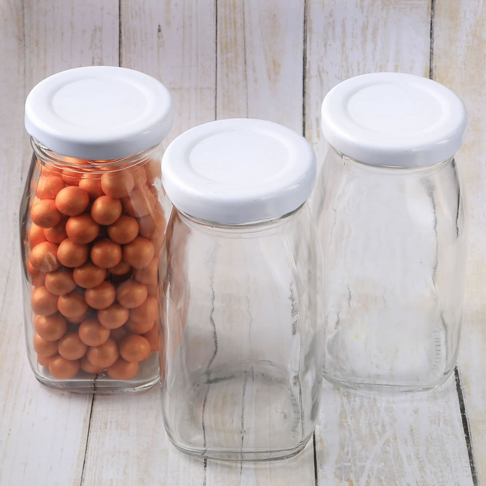Perfectly plain collection medium size glass vintage milk bottle