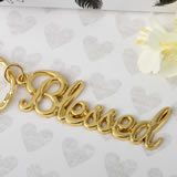 Blessed theme gold metal key chain from fashioncraft