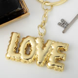 Love themed key chain finished with a mylar balloon design