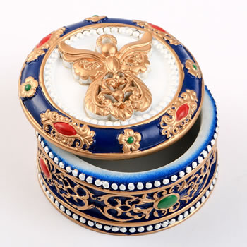angel covered box with ornate with gold accents